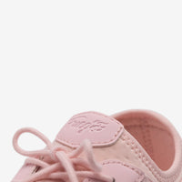 Roze tenisice s podijeljenim đonom